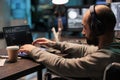Web developer with physical disability writing code Royalty Free Stock Photo