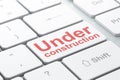 Web development concept: Under Construction on computer keyboard background Royalty Free Stock Photo