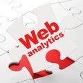 Web development concept: Web Analytics on puzzle background Royalty Free Stock Photo