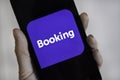 Web page with application Booking.com on smartphone