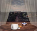 Rainy day, rain drops on window glass, evening scene, indoor, cozy room interior, journal writting, candle light Royalty Free Stock Photo