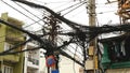 The web of power lines on the streets Ho Chi Minh City Royalty Free Stock Photo