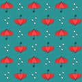 Red umbrellas seamless pattern with raindrops