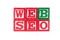 Web SEO Search Engine Optimization - Alphabet Baby Blocks on white Royalty Free Stock Photo