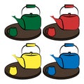 Set of four color teapots and cups on wooden trays