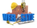 Web site building. Crane, wall and tools Royalty Free Stock Photo