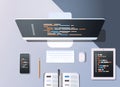 Web site design development program code programming concept top angle view desktop computer monitor tablet smartphone Royalty Free Stock Photo