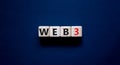 WEB3 or web 3 symbol. Wooden cubes with concept words WEB 3. Beautiful grey table, grey background, copy space. Business, Royalty Free Stock Photo