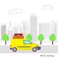 Yellow MiniVan carrying suitcases. Relocation, moving concept. Transportation and home removal. Van with cargo moving on the silh