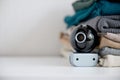Webcam hidden in a stack of clothes for covert surveillance of the house. Royalty Free Stock Photo