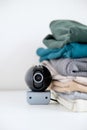 Webcam hidden in a stack of clothes for covert surveillance of the house. Royalty Free Stock Photo