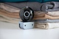 Webcam hidden in a stack of clothes for covert surveillance of the house. Royalty Free Stock Photo