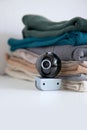 Webcam hidden in a stack of clothes for covert surveillance of the house. Royalty Free Stock Photo