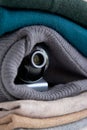 Webcam hidden in a stack of clothes for covert surveillance of the house. Royalty Free Stock Photo