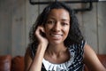 Webcam portrait of happy millennial black female having virtual meeting