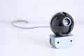 Webcam standalone closeup on white background for covert surveillance of the house. Royalty Free Stock Photo
