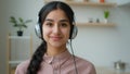 Webcam view Arabian woman smiling girl blogger businesswoman internet tutor business coach in headphones talk to camera Royalty Free Stock Photo