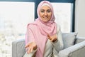 A young muslim woman wearing hijab, webcam view Royalty Free Stock Photo