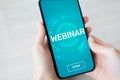 Webinar E-learning Online Training Coaching Education concept on mobile phone screen. Royalty Free Stock Photo