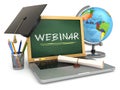 Webinar education concept. Laptop with blackboard, mortar board