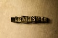 WEBMASTER - close-up of grungy vintage typeset word on metal backdrop