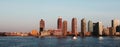 Website banner of New York cityscape, high skyscrapers on beach.