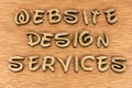 Website design services online wood letters Royalty Free Stock Photo