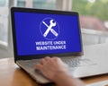 Website maintenance concept on a laptop Royalty Free Stock Photo