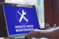 Website maintenance concept on a laptop screen Royalty Free Stock Photo