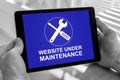 Website maintenance concept on a tablet Royalty Free Stock Photo
