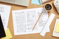 Website wireframe sketches over web designer desk