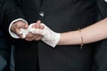 The groom holding the bride hand Royalty Free Stock Photo