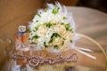 Wedding accessories. The bride's bouquet, pearls, perfumes and w Royalty Free Stock Photo