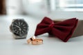 Wedding accessories, shoes, watches, rings, bow tie. The concept of marriage, family relationships, wedding paraphernalia Royalty Free Stock Photo