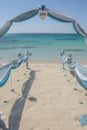 Wedding aisle setup on tropical beach Royalty Free Stock Photo