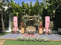 wedding altar and row of brown and white chairs shot at low angle prepared on the beautiful park or garden Royalty Free Stock Photo