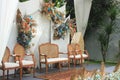 wedding altar and row of brown and white chairs shot at low angle prepared on the beautiful park or garden Royalty Free Stock Photo