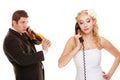 Wedding. Angry bride and groom talking on phone Royalty Free Stock Photo