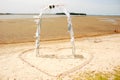 Wedding arch on beach Royalty Free Stock Photo