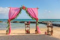 Wedding arch on the beach and a tropical beach. Royalty Free Stock Photo