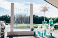 Wedding arch with bouquets of white peon and orchid flowers