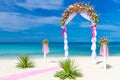 Wedding arch, cabana, gazebo on tropical beach