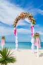 Wedding arch, cabana, gazebo on tropical beach