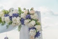 Wedding arch for the ceremony outdoors, fragment, close up. Symbol of eternal love between man and woman. Background is blue sky