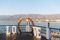 Wedding arch decorated with big letters love and lamps, ceremony place for the bride and groom, decor, flowers pink and