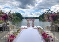 Wedding Arch Decorated Flowers Outdoors. Wedding Setup. Wedding Ceremony on The Beach in the Park. Natural Light. Selective Focus