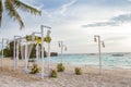 wedding arch - tent - decorated with flowers on beach, tropical wedding ceremony set up Royalty Free Stock Photo