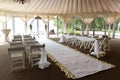 Wedding arch decorated with flowers. White carpet in the restaurant Royalty Free Stock Photo