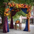 Wedding arch decorated with fresh fruits and flowers on the street Royalty Free Stock Photo