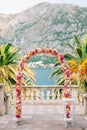 Wedding Arch of hydrangeas and roses. Wedding ceremony in the Ba Royalty Free Stock Photo